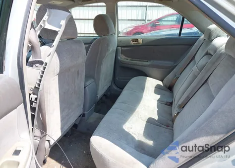 2002 Toyota Camry Le from USA, damaged, VIN 4T1BE32K82U595200